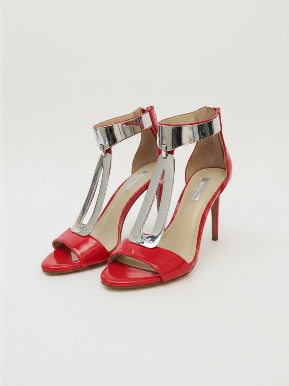 BCBGeneration Red Patent T-Strap Stiletto Sandals with Silver Mirror Accent